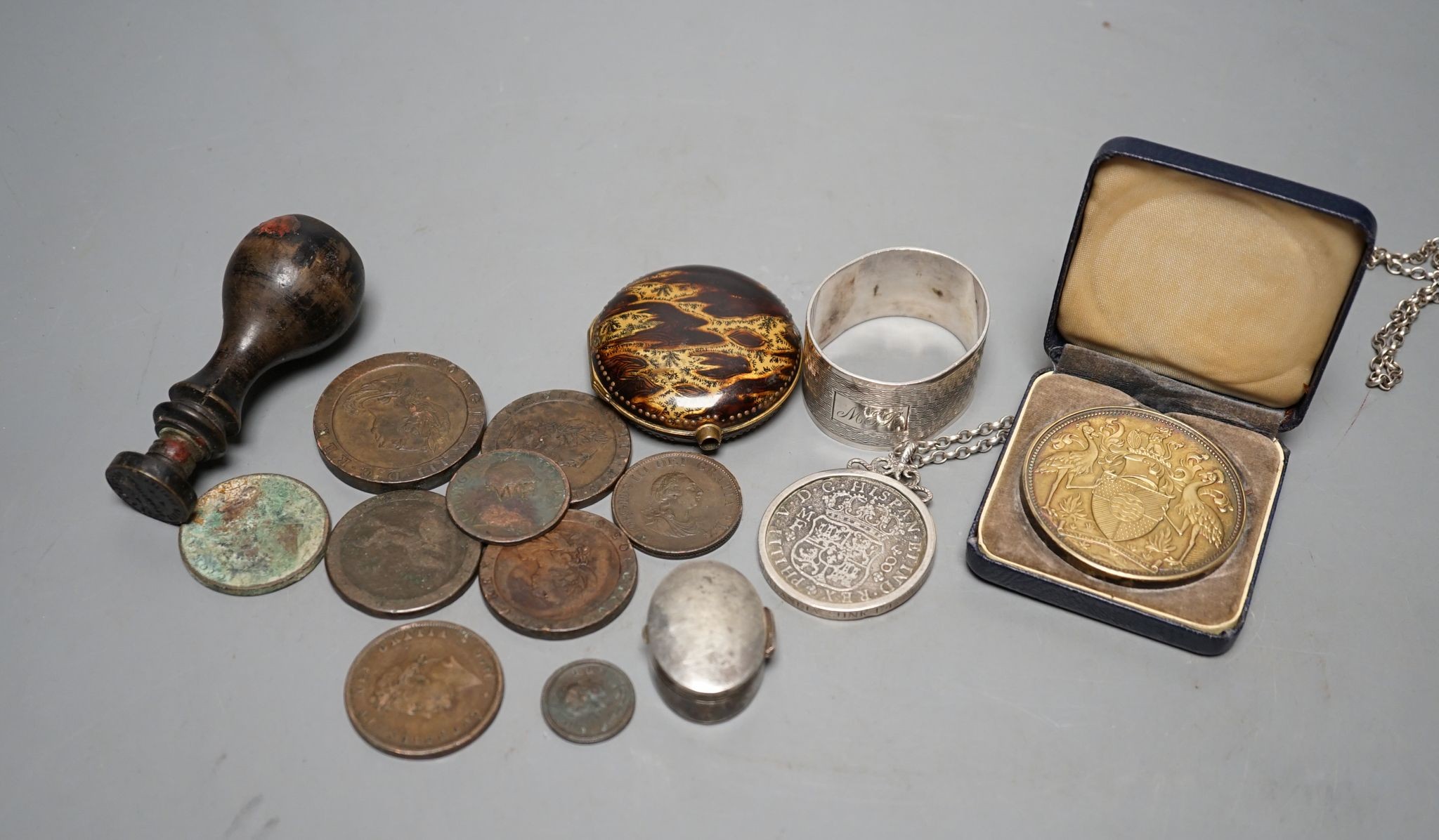 A Philip V 8 Reale coin pendant mounted, assorted 18th century and later coinage, faux tortoiseshell watch case and sundries